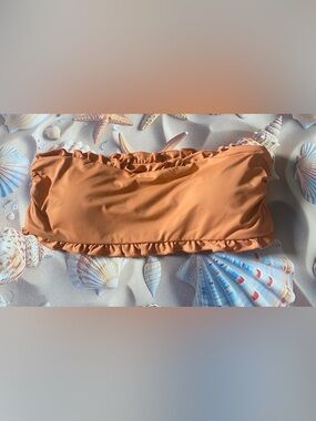 Dippin’ Daisy’s Orange
Bikini Top.